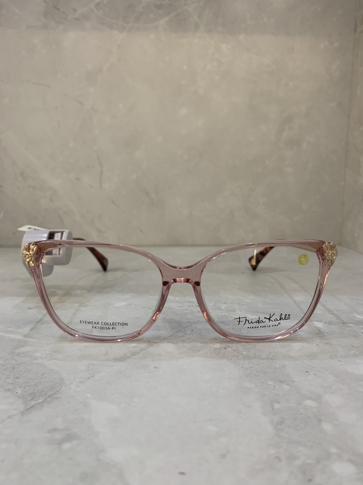 Frida Kahlo, Cat-eye rosa con brazos dorados