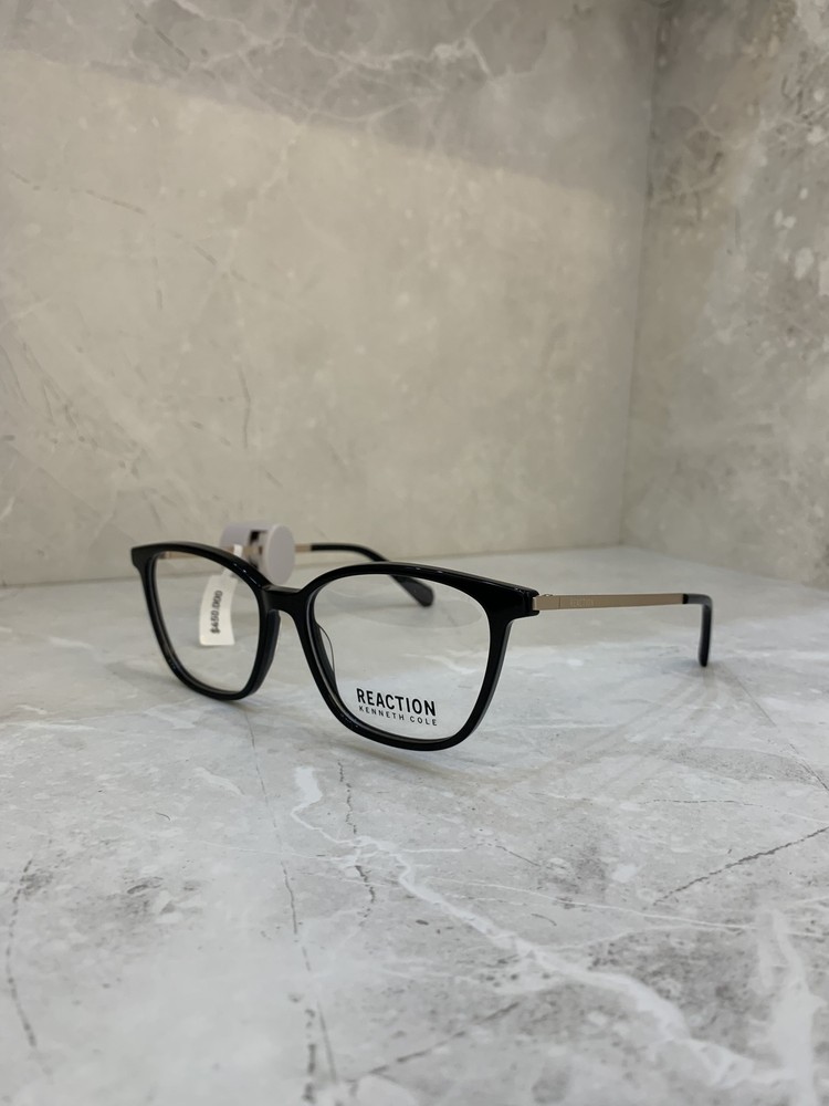 Kenneth Cole Reaction, Redondeada negra y dorada