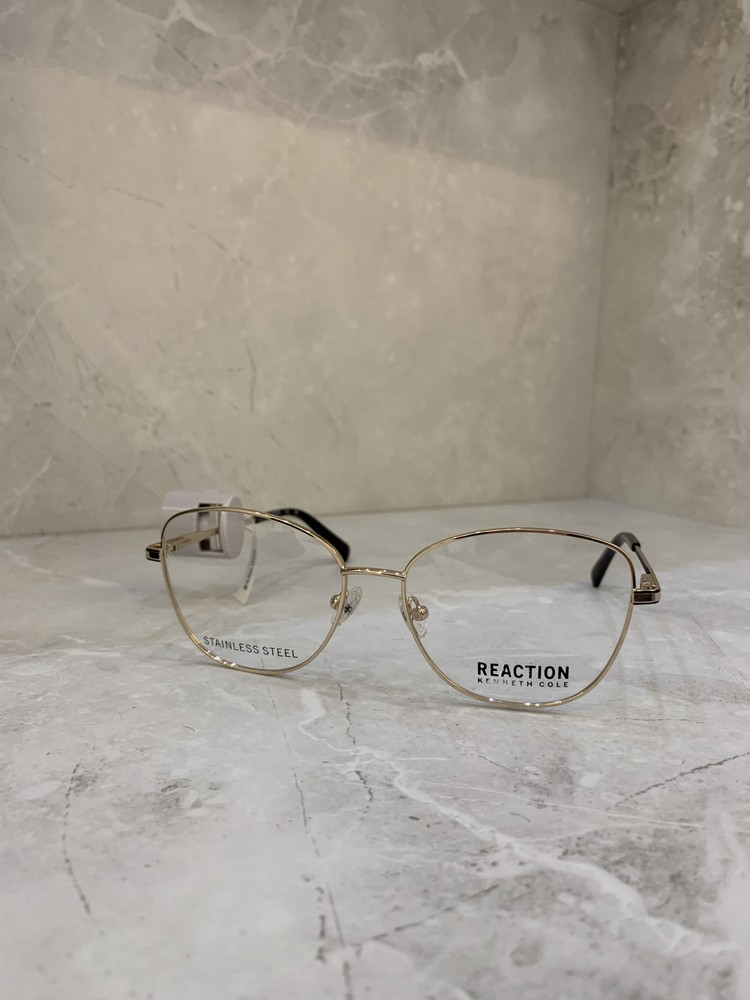 Kenneth Cole Reaction, Geométrica en acero dorado